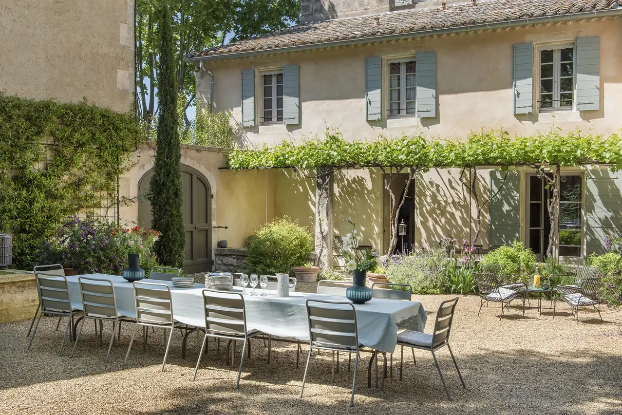 table set for 12 guests in the garden