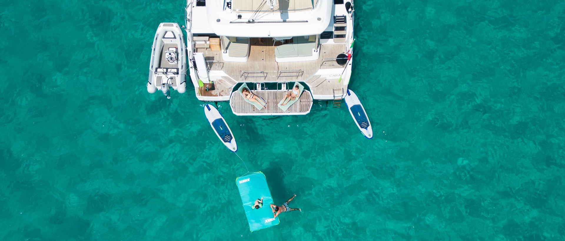 Exploring the blue waters at anchor