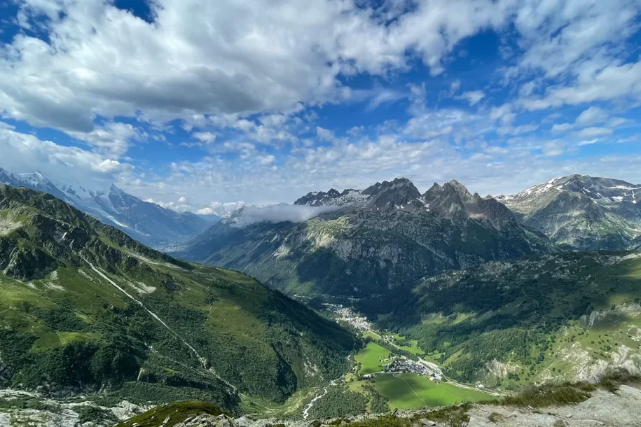 Aerial view of green Alpine valleys and traditional mountain villages on a tailor made Alpine trip
