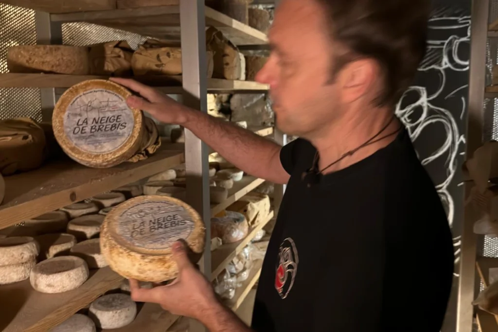 Stefano Lunardi showing La Neige de Brebis cheese