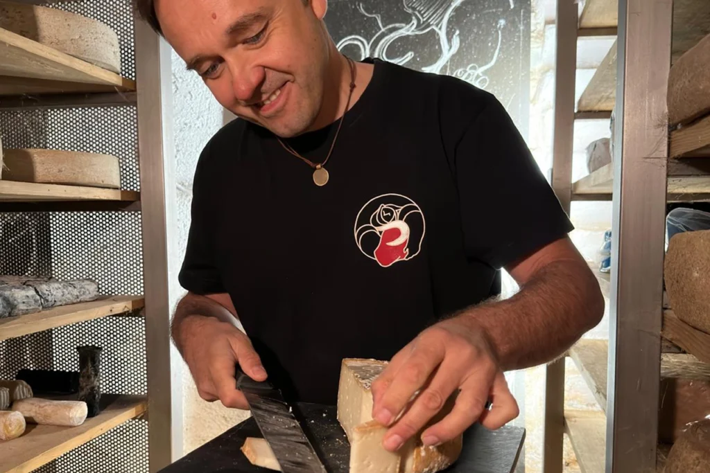 Stefano Lunardi cutting cheese